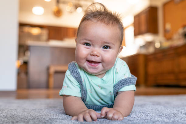 Cute baby on rug | Gilman Floors